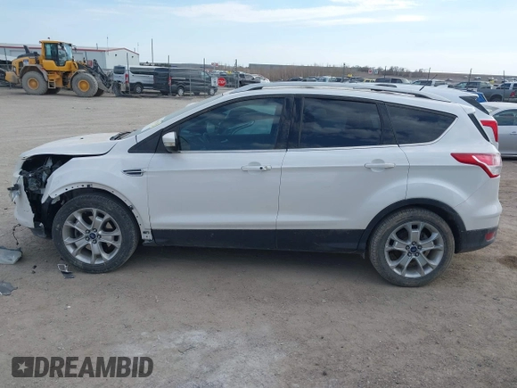 2015 Ford Escape Titanium with VIN 1FMCU9J90FUA67262, listed as a IAAI auction lot 41869583 with 161,281 mi miles. Bid and sale history available at carsss.com. Image 15.