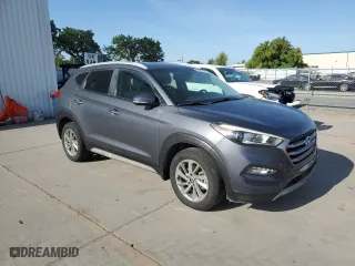2017 Hyundai Tucson Value with VIN KM8J33A25HU401072, listed as a Copart auction lot 53973115 with 138,204 mi miles and Salvage Title. Bid and sale history available at carsss.com. Image 4.