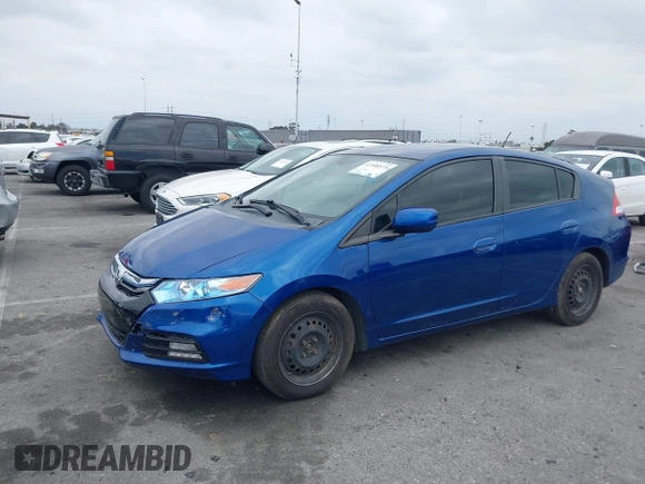 2012 Honda Insight LX with VIN JHMZE2H58CS001411, listed as a IAAI auction lot 42148575 with 155,586 mi miles and . Bid and sale history available at DreamBid. Image 2.