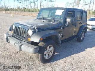 2007 Jeep Wrangler Unlimited X with VIN 1J4GA39127L159095, listed as a IAAI auction lot 41780974 with 179,791 mi miles. Bid and sale history available at carsss.com. Image 17.