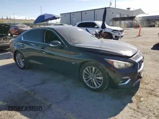 2019 Infiniti Q50 Luxe with VIN JN1EV7APXKM510124, listed as a Copart auction lot 59026325 with 43,228 mi miles and Salvage title. Bid and sale history available at DreamBid. Image 4.