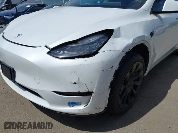 2020 Tesla Model Y Long Range with VIN 5YJYGDEE2LF058515, listed as a IAAI auction lot 41932748 with 62,885 mi miles and . Bid and sale history available at DreamBid. Image 21.