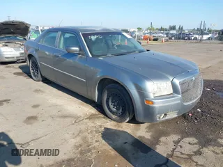 2006 Chrysler 300 Touring with VIN 2C3LA53G66H170047, listed as a IAAI auction lot 42135663 with 215,285 mi miles. Bid and sale history available at carsss.com. Image 1.