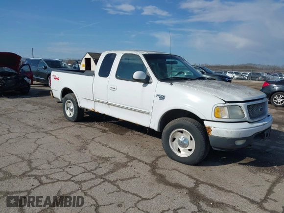 1999 Ford F-150 XL with VIN 2FTRX18L7XCA69231, listed as a IAAI auction lot 41880011 with 1 mi miles. Bid and sale history available at carsss.com. Image 1.