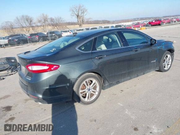 2016 Ford Fusion Titanium Hybrid with VIN 3FA6P0RU6GR156622, listed as a IAAI auction lot 41178887 with 92,423 mi miles. Bid and sale history available at carsss.com. Image 4.