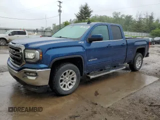 2019 GMC Sierra 1500 SLE z VIN 2GTV2MEC7K1100307, wystawiony jako Copart lot #60976895 z przebiegiem 61 890 mil mil oraz Czysty tytuł • Clean title. Historia ofert i sprzedaży dostępna na DreamBid. Obrazek 1.