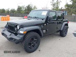 2018 Jeep Wrangler Unlimited Sport S with VIN 1C4HJXDG8JW105612, listed as a IAAI auction lot 42420765 with 54,873 mi miles and . Bid and sale history available at DreamBid. Image 16.