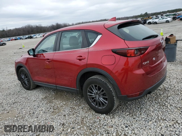 2021 Mazda CX-5 Sport with VIN JM3KFABM7M1304656, listed as a Copart auction lot 87547125 with 72,785 mi miles and Salvage Title. Bid and sale history available at carsss.com. Image 2.