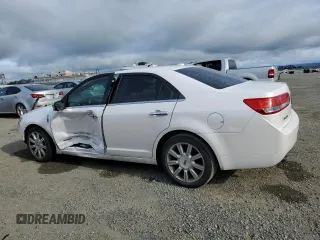 2012 Lincoln MKZ Hybrid z VIN 3LNDL2L30CR822565, wystawiony jako Copart lot #52122355 z przebiegiem 212 391 mil mil oraz Szkoda całkowita • Salvage title. Historia ofert i sprzedaży dostępna na DreamBid. Obrazek 2.