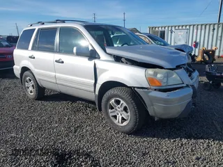 2003 Honda Pilot EX with VIN 2HKYF18663H597906, listed as a IAAI auction lot 41856184 with 234,406 mi miles and . Bid and sale history available at carsss.com. Image 1.