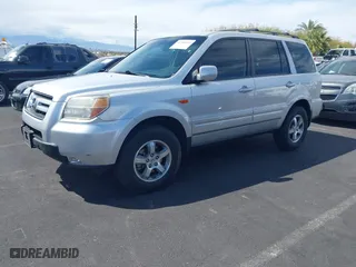 2007 Honda Pilot EX-L with VIN 5FNYF28677B005956, listed as a IAAI auction lot 41948401 with 185,599 mi miles. Bid and sale history available at carsss.com. Image 2.