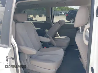 2010 Kia Sedona LX with VIN KNDMG4C33A6338047, listed as a IAAI auction lot 42128485 with 99,498 mi miles and . Bid and sale history available at carsss.com. Image 8.