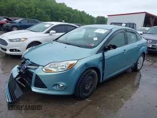 2012 Ford Focus SE with VIN 1FAHP3F21CL226033, listed as a IAAI auction lot 42368786 with 168,061 mi miles and . Bid and sale history available at DreamBid. Image 2.