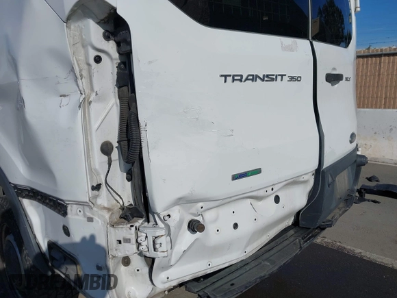 2016 Ford Transit Cargo z VIN 1FTYR1YM3GKA01650, wystawiony jako IAAI lot #41242238 z przebiegiem 145 073 mil mil oraz . Historia ofert i sprzedaży dostępna na DreamBid. Obrazek 6.