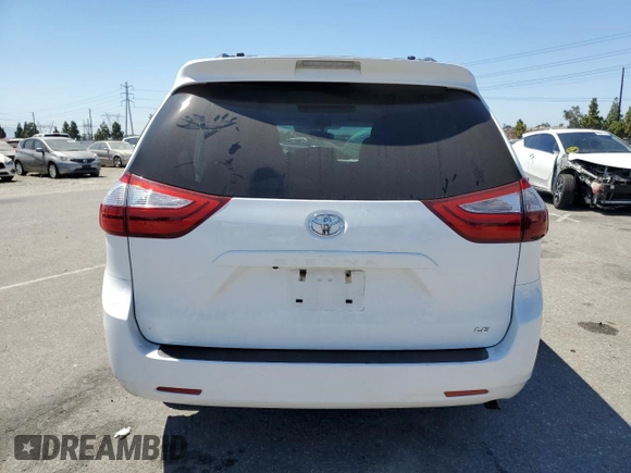 2016 Toyota Sienna LE AAS with VIN 5TDKK3DC4GS717016, listed as a Copart auction lot 70089664 with 131,654 mi miles and Salvage Title. Bid and sale history available at carsss.com. Image 6.
