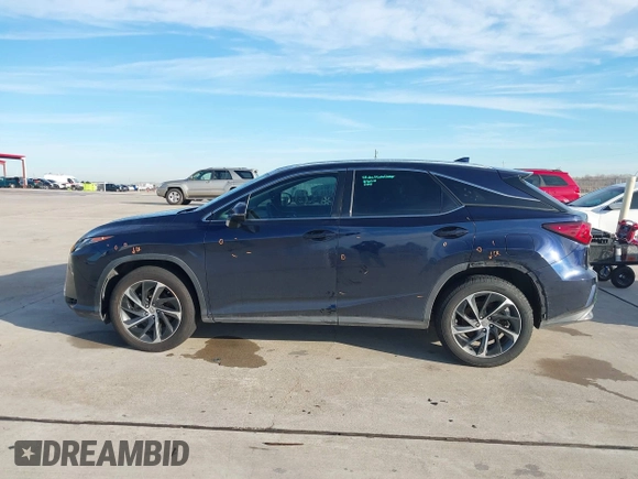 2016 Lexus RX with VIN 2T2ZFMCA2GC001163, listed as a IAAI auction lot 41349745 with 191,916 mi miles and . Bid and sale history available at DreamBid. Image 14.