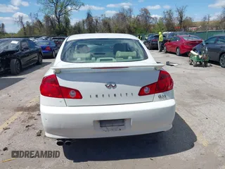 2005 Infiniti G35 with VIN JNKCV51F05M311537, listed as a IAAI auction lot 42051242 with 205,105 mi miles and . Bid and sale history available at carsss.com. Image 17.