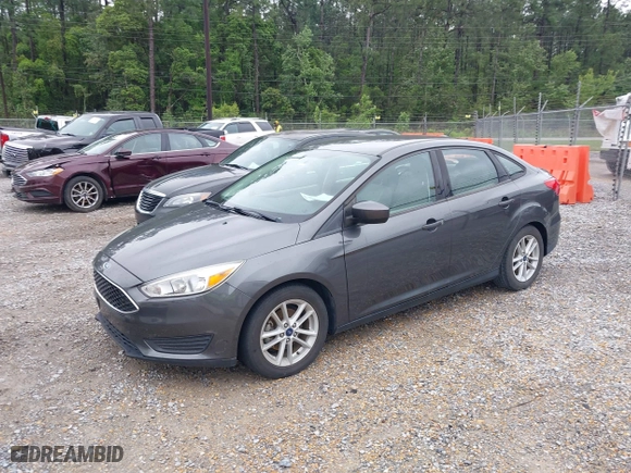 2018 Ford Focus SE with VIN 1FADP3FE9JL275194, listed as a IAAI auction lot 41979690 with 95,383 mi miles. Bid and sale history available at carsss.com. Image 17.