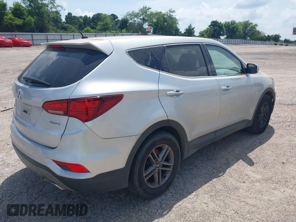 2018 Hyundai Santa Fe 2.4L with VIN 5XYZT3LB4JG557373, listed as a IAAI auction lot 42511741 with 142,572 mi miles and . Bid and sale history available at DreamBid. Image 4.
