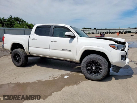 2017 Toyota Tacoma SR5 with VIN 3TMAZ5CN9HM052721, listed as a Copart auction lot 59791615 with 67,019 mi miles and Salvage title. Bid and sale history available at DreamBid. Image 4.