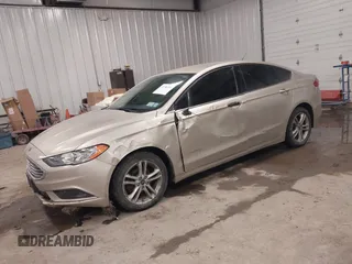 2018 Ford Fusion S z VIN 3FA6P0UU5JR100377, wystawiony jako IAAI lot #41300284 z przebiegiem 108 936 mil mil oraz . Historia ofert i sprzedaży dostępna na DreamBid. Obrazek 17.