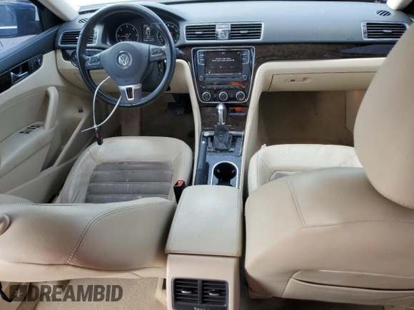 2014 Volkswagen Passat SEL Premium z VIN 1VWCN7A34EC066375, wystawiony jako Copart lot #54016005 z przebiegiem 170 305 mil mil oraz Szkoda całkowita • Salvage title. Historia ofert i sprzedaży dostępna na DreamBid. Obrazek 8.