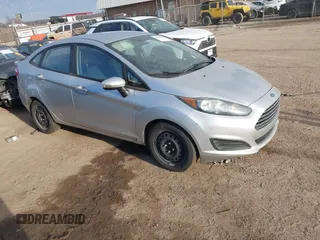 2015 Ford Fiesta SE z VIN 3FADP4BJ6FM178971, wystawiony jako IAAI lot #41655940 z przebiegiem 146 694 mil mil oraz . Historia ofert i sprzedaży dostępna na DreamBid. Obrazek 1.
