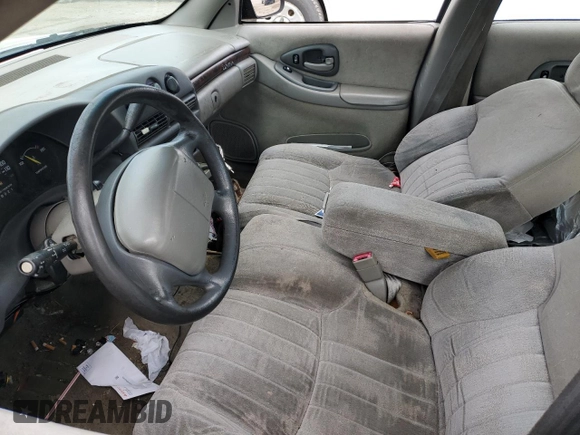 1999 Chevrolet Lumina with VIN 2G1WL52MXX1107255, listed as a Copart auction lot 76585174 with 153,962 mi miles and Salvage Title. Bid and sale history available at DreamBid. Image 7.
