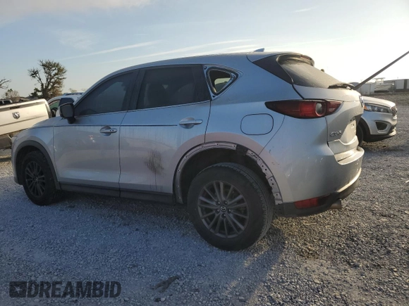2020 Mazda CX-5 Touring with VIN JM3KFACM8L0764878, listed as a Copart auction lot 49303865 with 114,890 mi miles and Salvage Title. Bid and sale history available at carsss.com. Image 2.
