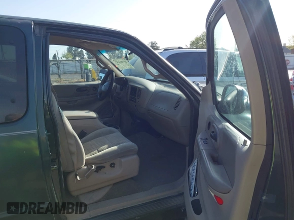 2002 Ford F-150 XL with VIN 1FTRX17L42NA52360, listed as a IAAI auction lot 41886697 with 121,346 mi miles. Bid and sale history available at carsss.com. Image 5.