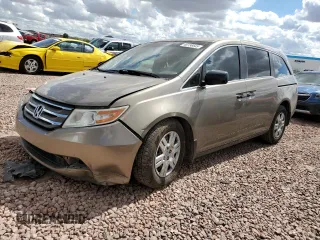 2012 Honda Odyssey LX z VIN 5FNRL5H27CB072708, wystawiony jako Copart lot #48736645 z przebiegiem 231 182 mil mil oraz Szkoda całkowita • Salvage title. Historia ofert i sprzedaży dostępna na DreamBid. Obrazek 1.