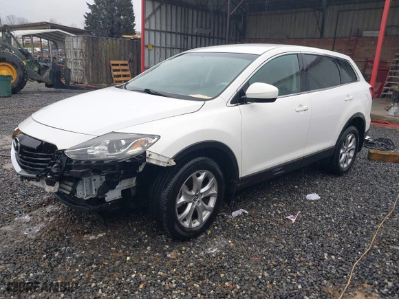 2015 Mazda CX-9 Touring with VIN JM3TB2CA1F0449033, listed as a IAAI auction lot 41549205 with 95,106 mi miles. Bid and sale history available at carsss.com. Image 20.