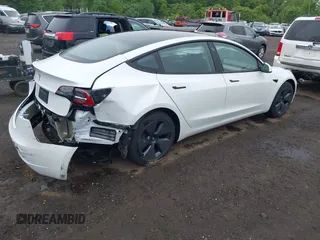 2023 Tesla Model 3 z VIN 5YJ3E1EA6PF570876, wystawiony jako IAAI lot #42366310 z przebiegiem 13 005 mil mil oraz . Historia ofert i sprzedaży dostępna na DreamBid. Obrazek 4.