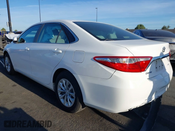 2015 Toyota Camry XLE with VIN 4T1BF1FK9FU923208, listed as a IAAI auction lot 42076970 with 124,096 mi miles and . Bid and sale history available at carsss.com. Image 3.
