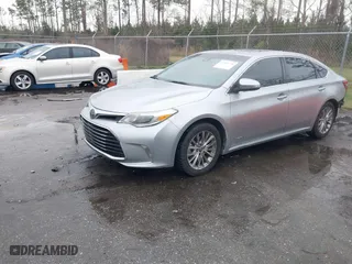 2016 Toyota Avalon Hybrid XLE Premium with VIN 4T1BD1EBXGU052909, listed as a IAAI auction lot 41587776 with 87,856 mi miles. Bid and sale history available at carsss.com. Image 17.