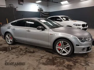 2018 Audi A7 Prestige z VIN WAU23AFC4JN034435, wystawiony jako IAAI lot #41193774 z przebiegiem 61 833 mil mil oraz . Historia ofert i sprzedaży dostępna na DreamBid. Obrazek 1.