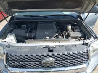 2018 Toyota Tundra 2WD SR with VIN 5TFRM5F16JX133735, listed as a IAAI auction lot 41818455 with 148,456 mi miles. Bid and sale history available at carsss.com. Image 10.