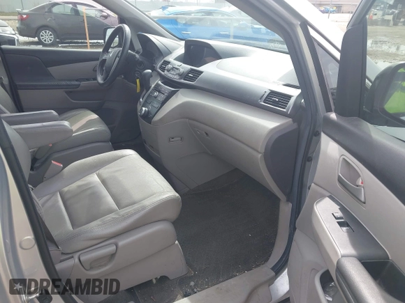 2013 Honda Odyssey LX with VIN 5FNRL5H22DB086503, listed as a IAAI auction lot 42133471 with 223,200 mi miles and . Bid and sale history available at carsss.com. Image 5.