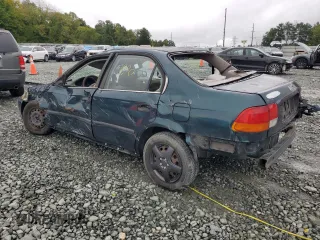 1997 Honda Civic DX with VIN JHMEJ6624VS038386, listed as a Copart auction lot 71541574 with 385,295 mi miles and Salvage Title. Bid and sale history available at carsss.com. Image 2.