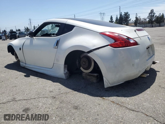 2012 Nissan 370Z z VIN JN1AZ4EH1CM562134, wystawiony jako Copart lot #56708065 z przebiegiem Nie podano mil oraz Szkoda całkowita • Salvage title. Historia ofert i sprzedaży dostępna na DreamBid. Obrazek 2.