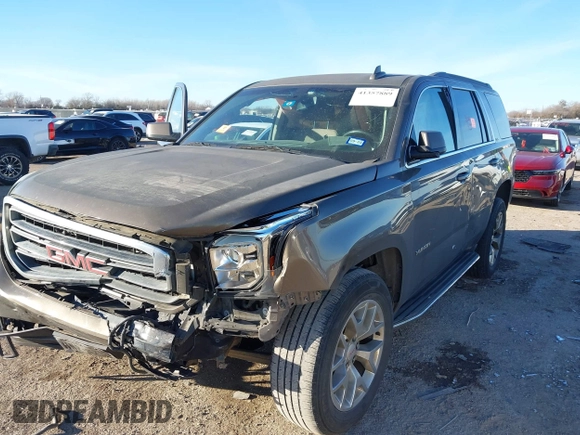 2015 GMC Yukon SLE with VIN 1GKS1AKCXFR712897, listed as a IAAI auction lot 41357889 with 1 mi miles. Bid and sale history available at carsss.com. Image 2.