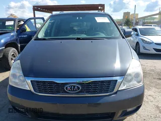 2012 Kia Sedona EX with VIN KNDMH4C79C6465307, listed as a IAAI auction lot 41958886 with 146,130 mi miles. Bid and sale history available at carsss.com. Image 12.