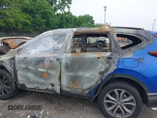 2021 Honda CR-V Touring with VIN 7FARW2H98ME008086, listed as a IAAI auction lot 42411519 with Not provided miles and . Bid and sale history available at DreamBid. Image 13.