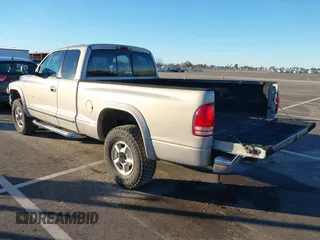 2000 Dodge Dakota Sport with VIN 1B7GG22N6YS690223, listed as a IAAI auction lot 41244256 with 147,443 mi miles. Bid and sale history available at carsss.com. Image 3.