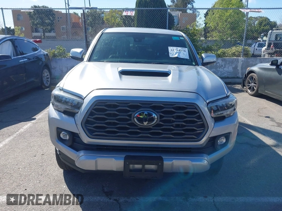 2022 Toyota Tacoma SR5 with VIN 3TMDZ5BN6NM122590, listed as a IAAI auction lot 41714578 with 56,472 mi miles and . Bid and sale history available at DreamBid. Image 12.