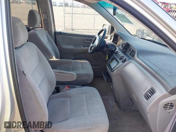 2004 Honda Odyssey LX with VIN 5FNRL18534B007617, listed as a IAAI auction lot 42687524 with 220,079 mi miles and . Bid and sale history available at DreamBid. Image 5.