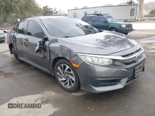 2018 Honda Civic Sedan EX with VIN 2HGFC2F73JH572129, listed as a IAAI auction lot 41719495 with 134,014 mi miles. Bid and sale history available at carsss.com. Image 1.