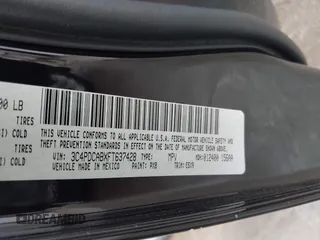 2015 Dodge Journey American Value Pkg with VIN 3C4PDCABXFT637428, listed as a IAAI auction lot 41507850 with 209,050 mi miles. Bid and sale history available at carsss.com. Image 9.