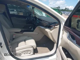 2013 Cadillac XTS Luxury with VIN 2G61P5S34D9138319, listed as a IAAI auction lot 42626756 with 88,743 mi miles and . Bid and sale history available at DreamBid. Image 5.