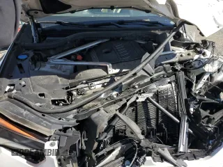 2020 BMW X5 xDrive40i with VIN 5UXCR6C02L9C46986, listed as a Copart auction lot 49099615 with Not provided miles and Salvage title. Bid and sale history available at DreamBid. Image 13.